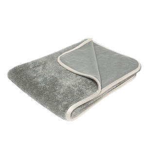 A grey microfiber towel is displayed with a blank background
