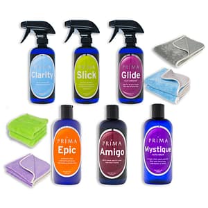 Six bottles of Prima Car Care products are displayed with a blank background and four microfiber towels